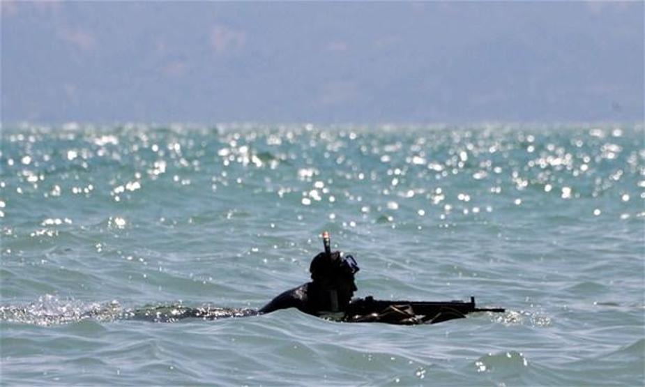 Elleri, ayakları ve gözleri bağlı suya atıldılar