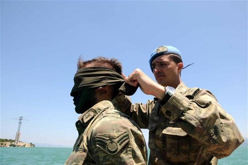 Elleri, ayakları ve gözleri bağlı suya atıldılar