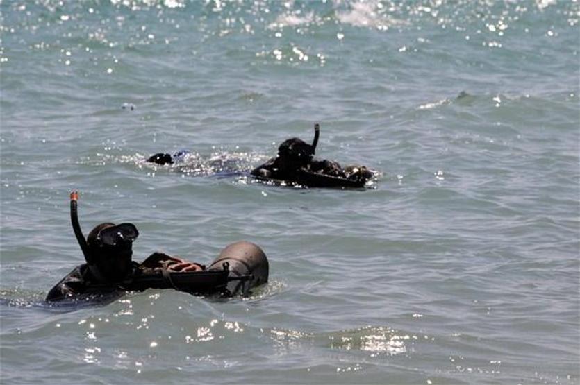 Elleri, ayakları ve gözleri bağlı suya atıldılar