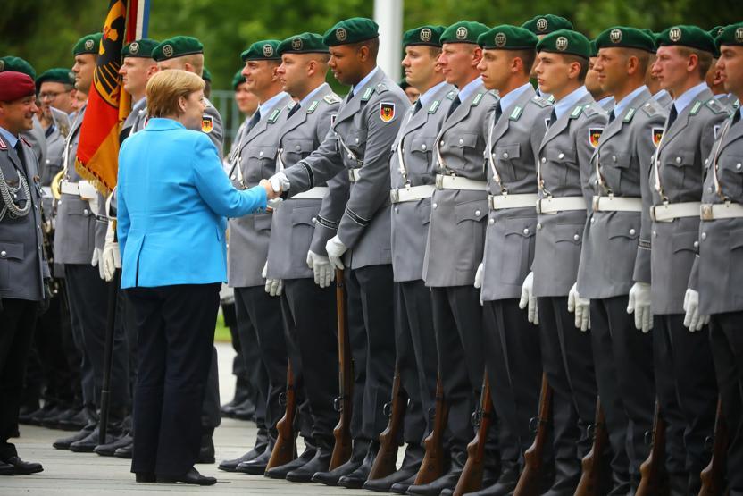 Almanya Başbakanı Angela Merkel üçüncü kez titredi