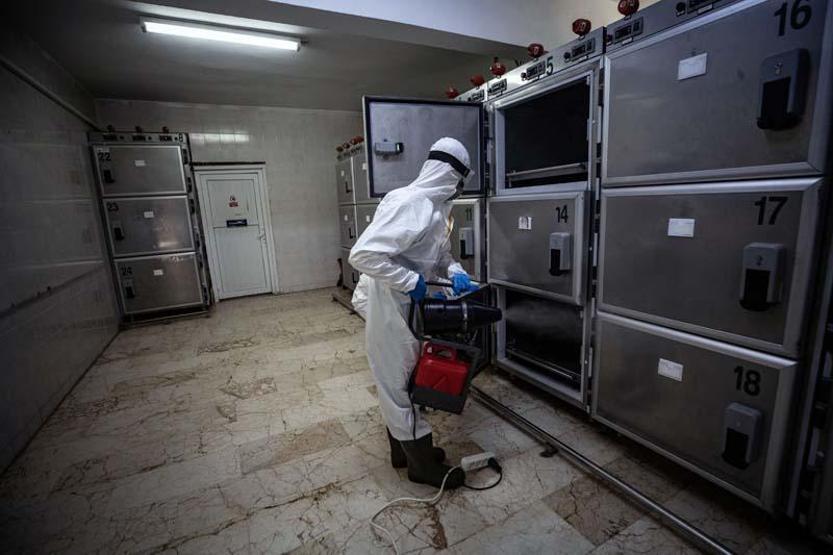 İlk kez görüntülendi... Kovid -19dan ölenlerin cenaze işlemleri böyle yapılıyor