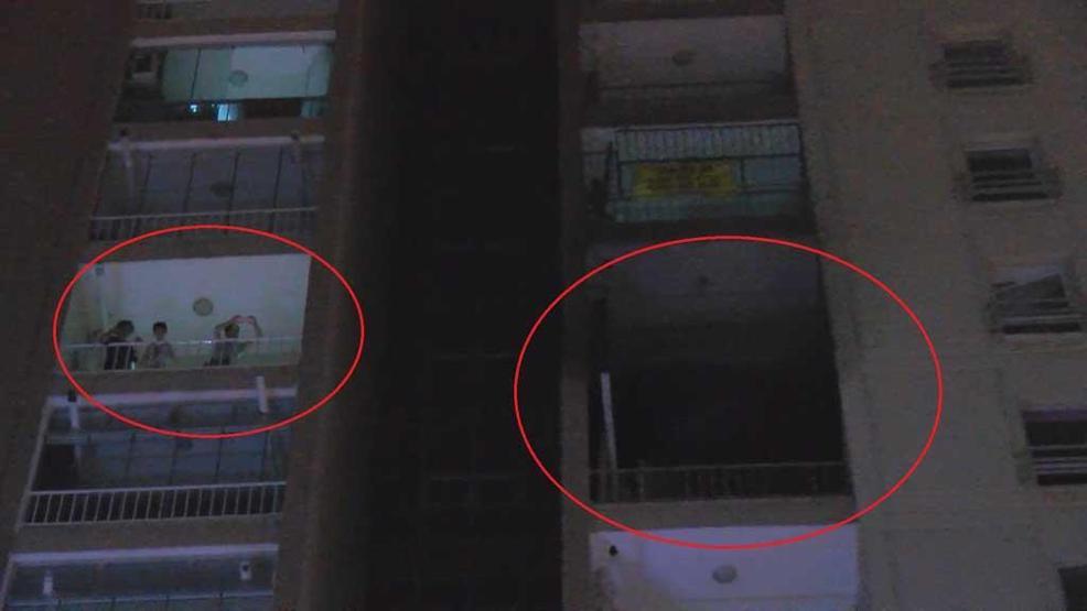 Bursada 23 katlı binadaki yangında, evlerini tahliye etmeyerek görüntü çektiler