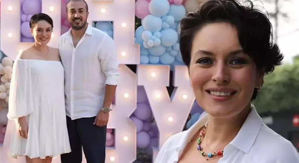 Ezgi Mola bebeğini kucağına aldı