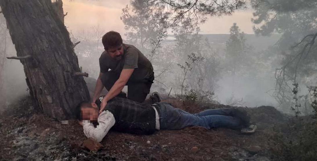Ormandaki yangında yerde yatarken bulundu; Isınmak amacıyla yaktım dedi
