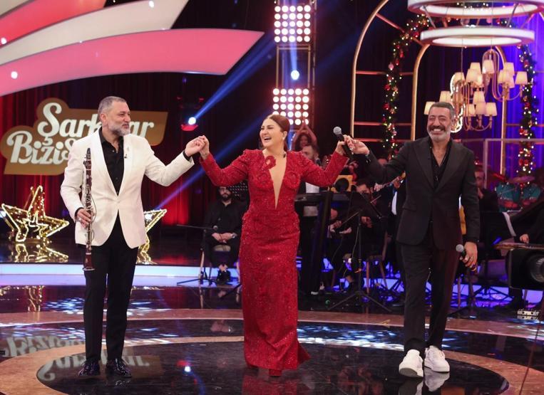 ŞARKILAR BİZİ SÖYLER 2026 YILBAŞI ÖZEL KONUKLARI Şarkılar Bizi Söyler Yılbaşı Konukları Kimler, Hangi Ünlüler Var İşte Sibel Can, Hakan Altun ve Hüsnü Şenlendiriciden Müzik Ziyafeti...