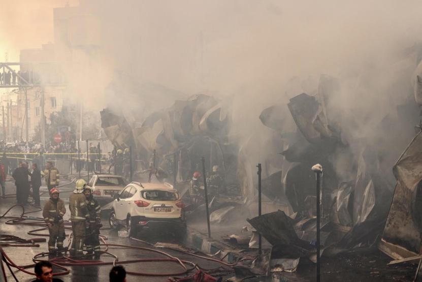İranın kalbinde büyük yangın Çarşıdan alevler yükseldi: 200 dükkan küle döndü...