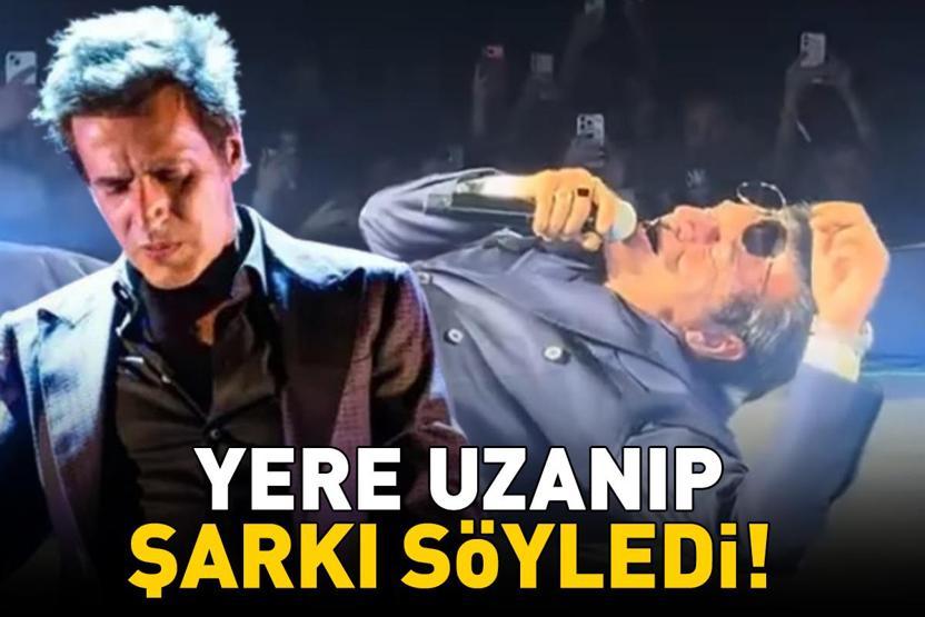 Rock yıldızı Teomandan ilginç performans Yere uzanıp şarkı söyledi