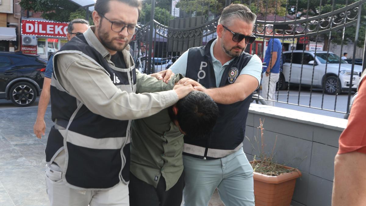 Eşini sokak ortasında darbeden şüpheli adliyede