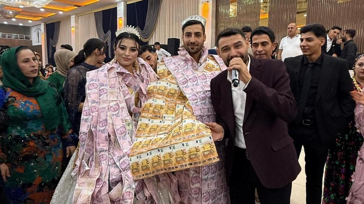 YOK ARTIK! Mardin'deki düğünde gelin ve damada paradan yelek giydirilip, taç takıldı