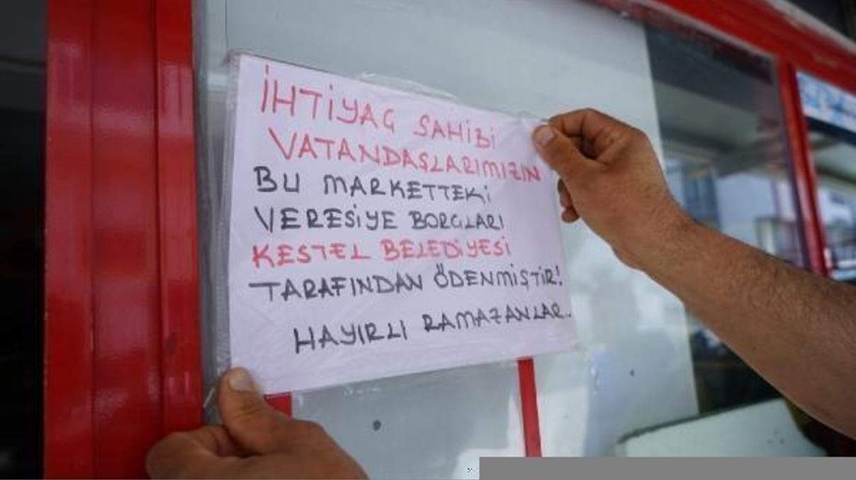 Veresiye defterleri, elektrik ve su borçları Kestel Belediyesi tarafından ödendi