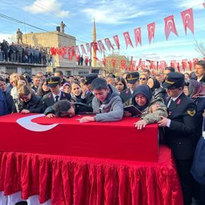 Şehit oğlunu son yolculuğuna Allahım cennetine al diyerek uğurladı