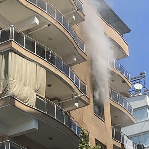 Aydında 7 katlı binadaki dairede çıkan yangın söndürüldü