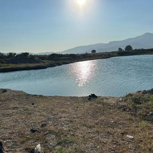 Serinlemek için girdiği gölette boğuldu
