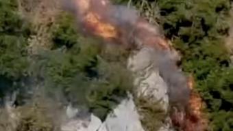 Orman işçileri, alevlerden son anda kurtuldu