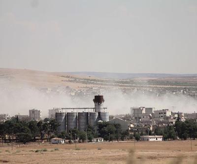 Kobanide çatışmalar sürüyor, sınırdan ağıtlar yükseliyor