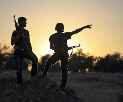 Eğit - donat komutanı cephaneyi Nusra Cephesine teslim etti