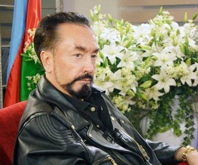 Adnan Oktardan Diyanet İşleri Başkanı Erbaşa kedicik yanıtı