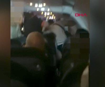 Afrikalı kadına uçakta yumruklu saldırı | Video