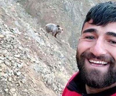 Ayının peşinden koşup selfie çekti