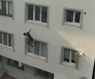 Polisten kaçan şüpheli çatıdan inmeye çalışırken beton zemine düştü