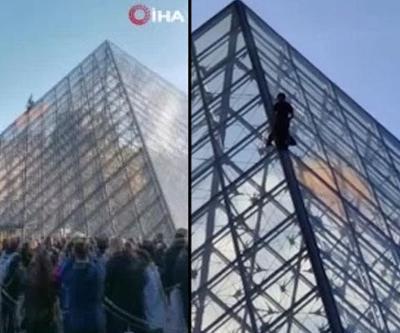 İklim aktivistlerinden turuncu protesto: Bu defa Louvre piramidini boyadılar