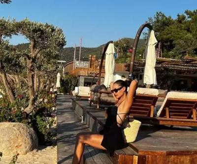 Fahriye Evcen siyah mayosu ile ortalığı kasıp kavurdu