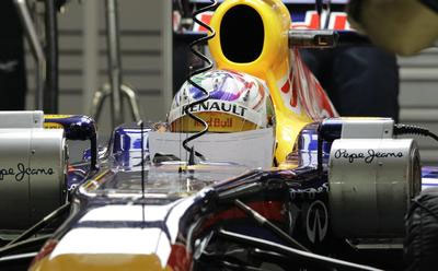 Singapurda pole position Vettelin