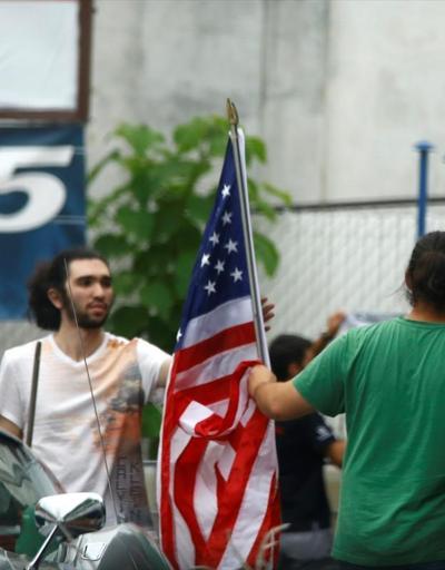 Adil Öksüz’ün kayınbiraderi ABD bayrağını öperken görüntülendi