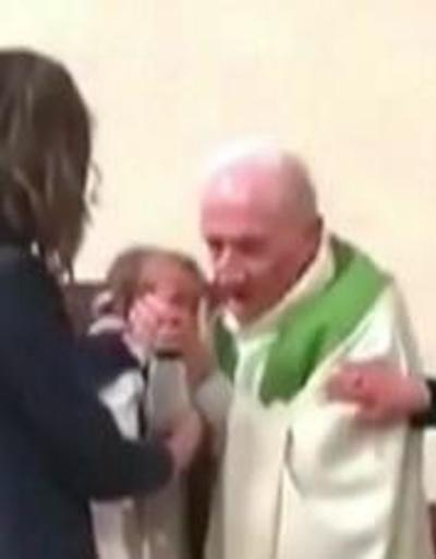 Papaz, vaftiz töreninde bebeğe tokat attı