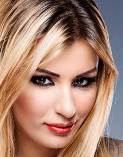Silahlı saldırıda ölen İzmirli şarkıcı Hacer Tülü toprağa verildi