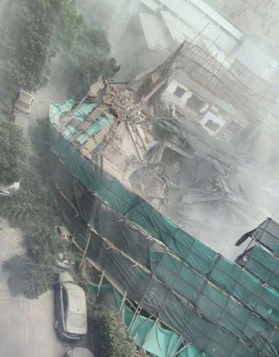 Son dakika... Şanghayda bir bina çöktü: Çok sayıda kişi mahsur