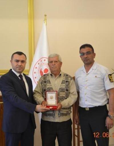 Büyükorhan’da Kıbrıs Gazisine madalya verildi