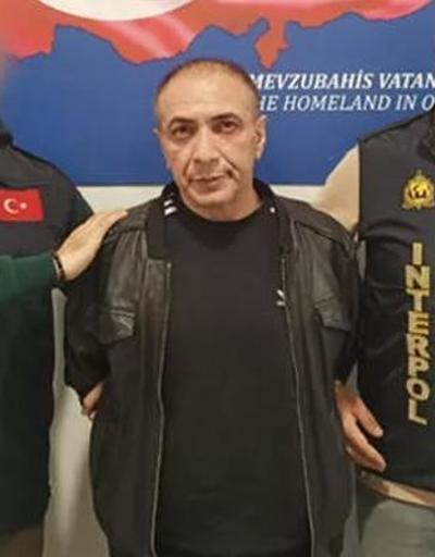 Kırmızı bülten ile aranan Serkan Akbaba yakalanarak Türkiyeye getirildi
