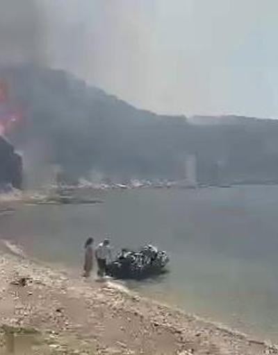 SON DAKİKA: İzmir’deki orman yangınında vatandaşlar denizden tahliye ediliyor