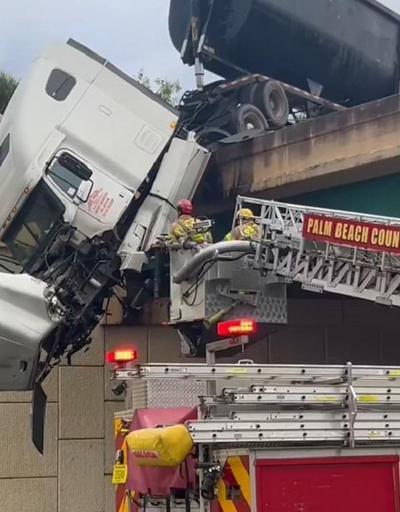 Aracı üst geçitte asılı kalan ABDli kamyon şoförü kurtarıldı