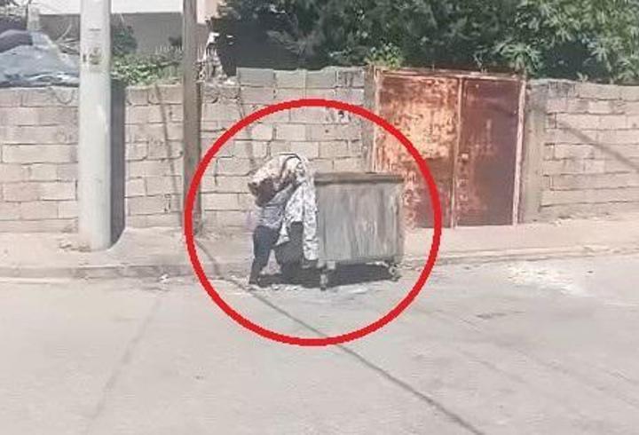 Çocuğun eski kilimi konteynere attığı anlar kamerada; ödüllendirilecek