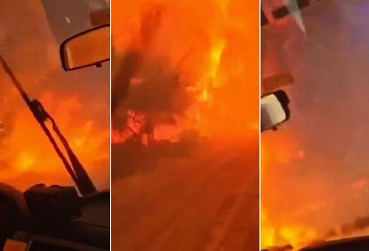 İzmir Buca'daki orman yangınında ekipler alevlerin arasında kaldı