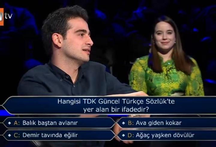 Hangisi TDK Güncel Türkçe Sözlük'te yer alan bir ifadedir?