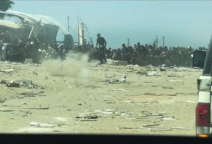 BM ekibi Gazze'de yardım bekleyenlere açılan ateşi kaydetti