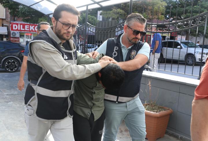 Eşini sokak ortasında darbeden şüpheli adliyede