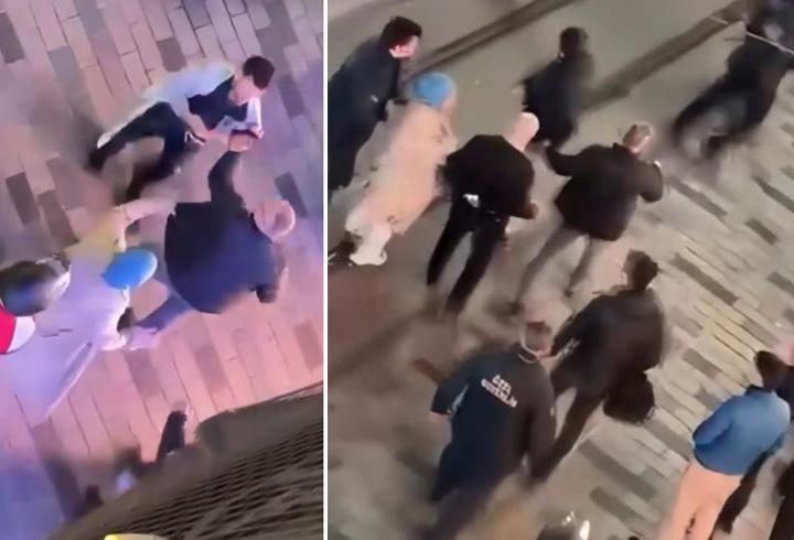 O anlar kamerada: Taksim'de tekme tokat kavga!