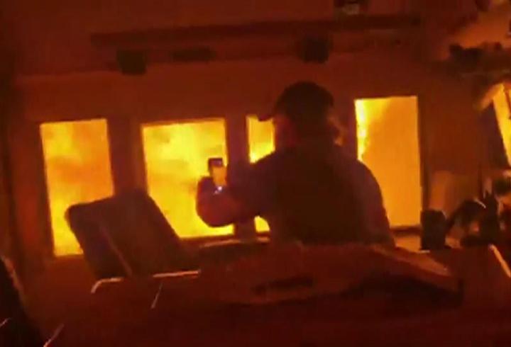 Alevlerin ortasında ölüm yolculuğu! Yük treni ateş tünelinden geçti
