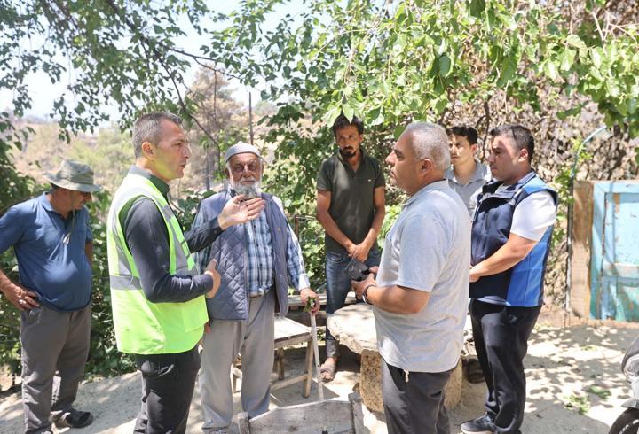 Muğla Büyükşehir Belediyesi ekipleri orman yangınından etkilenen mahallelerde incelemelerde bulundu