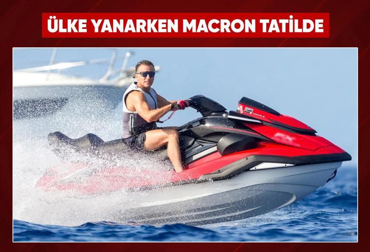 Fransa yanarken Macron jet ski üstünde
