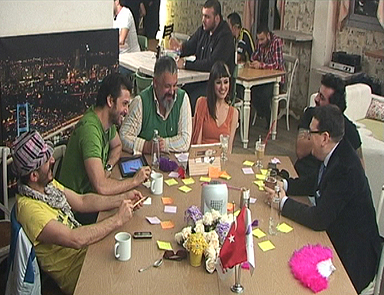 Emre Tilev Yan Masadaydı