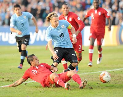Forlan Internacionalle anlaştı
