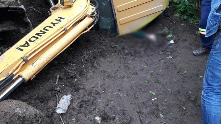 Devrilen iş makinesinin altında kalan operatör öldü