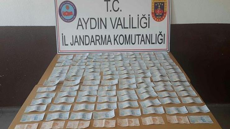 Evinde sahte paralarla yakalandı