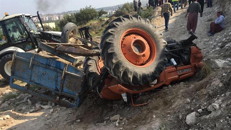 İtfaiye devrilen traktörün altından zor çıkardı