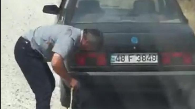 Otomobilin arkasına bağladığı köpeği sürükledi
